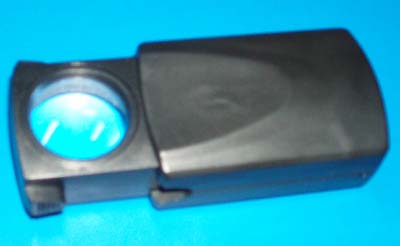 Slide jewel loupe
