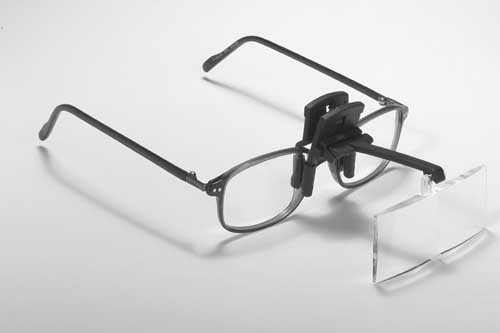 Clip on magnifier for people with glasses